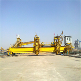 bridge-type reclaimer with Bucket Wheel in longitudinal stockyard
